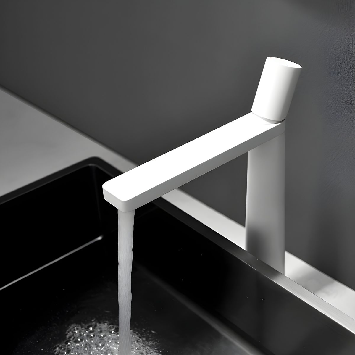 Thalruvne | Modern Cylindrical Silhouette Single Hole Bathroom Sink Tap with Rotary Knob