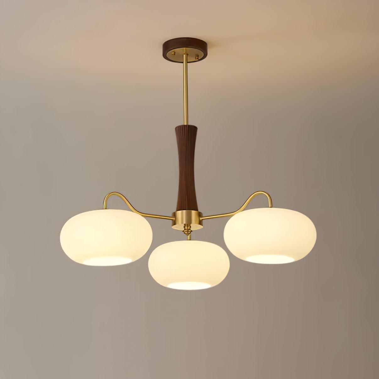 Vaelara | Frosted Globe Mid-Century Brass Arms Chandelier