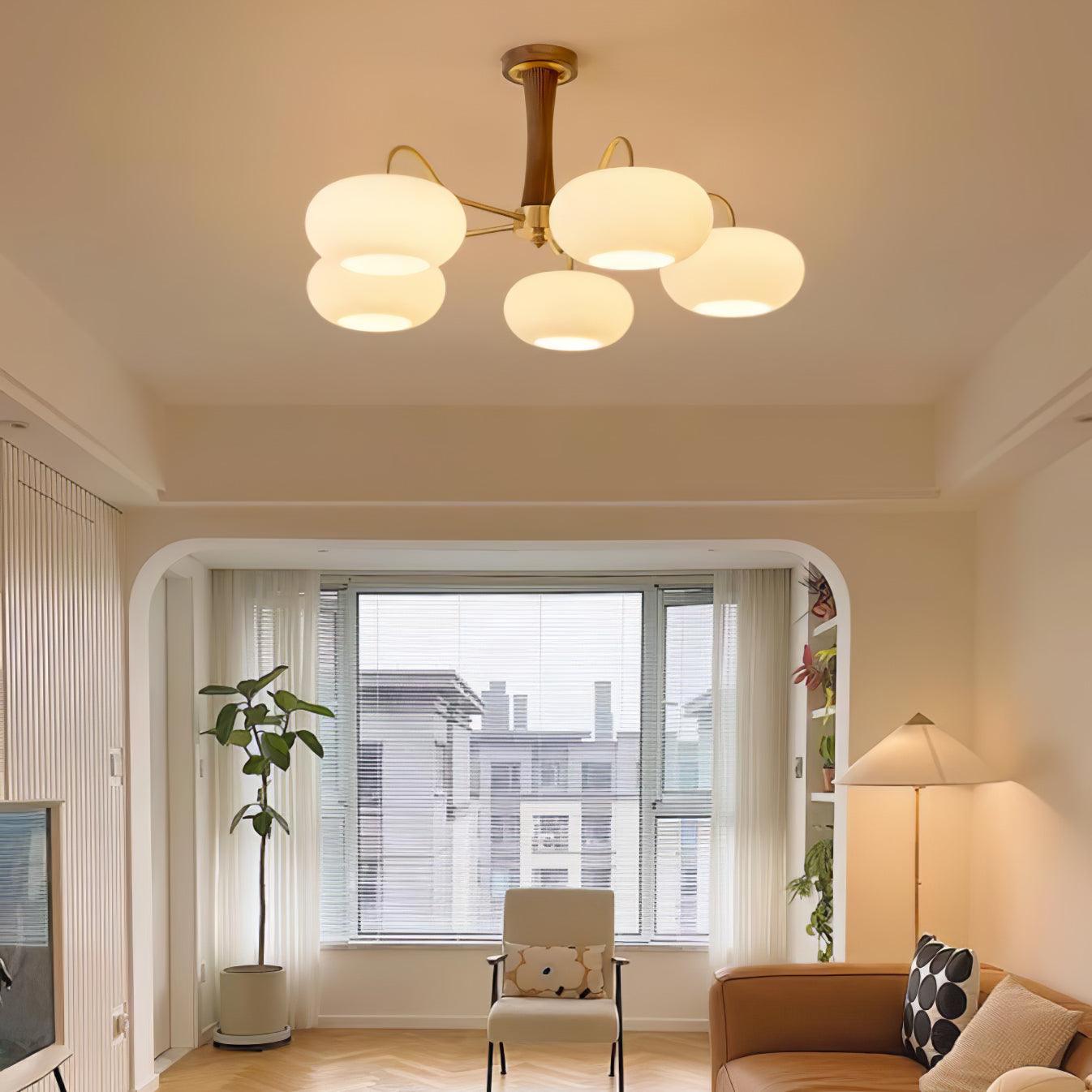 Vaelara | Frosted Globe Mid-Century Brass Arms Chandelier
