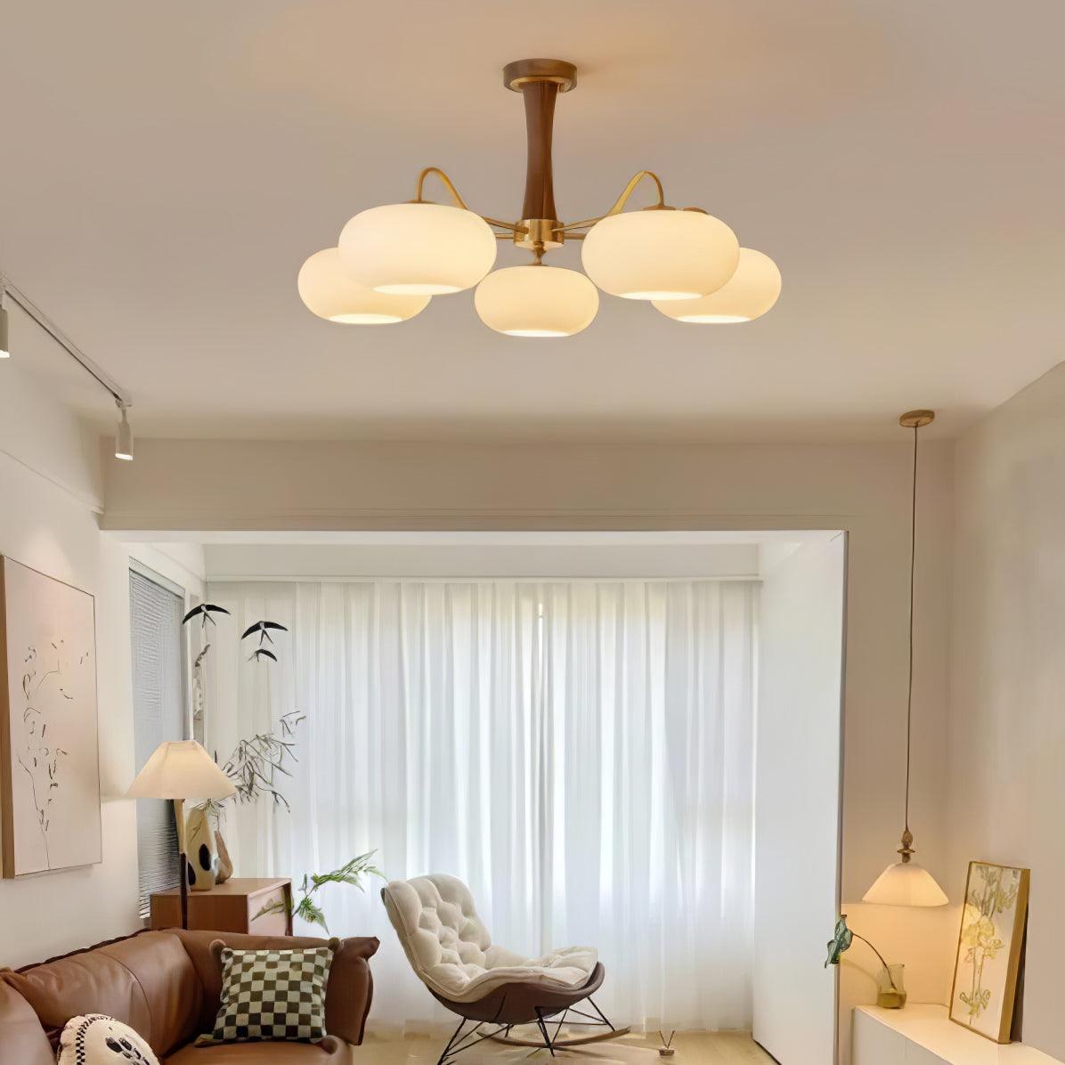 Vaelara | Frosted Globe Mid-Century Brass Arms Chandelier
