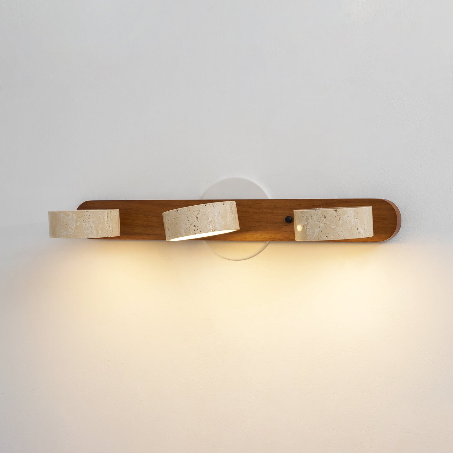 Nyxoris | Geometric Textured Travertine Vanity Wall Light