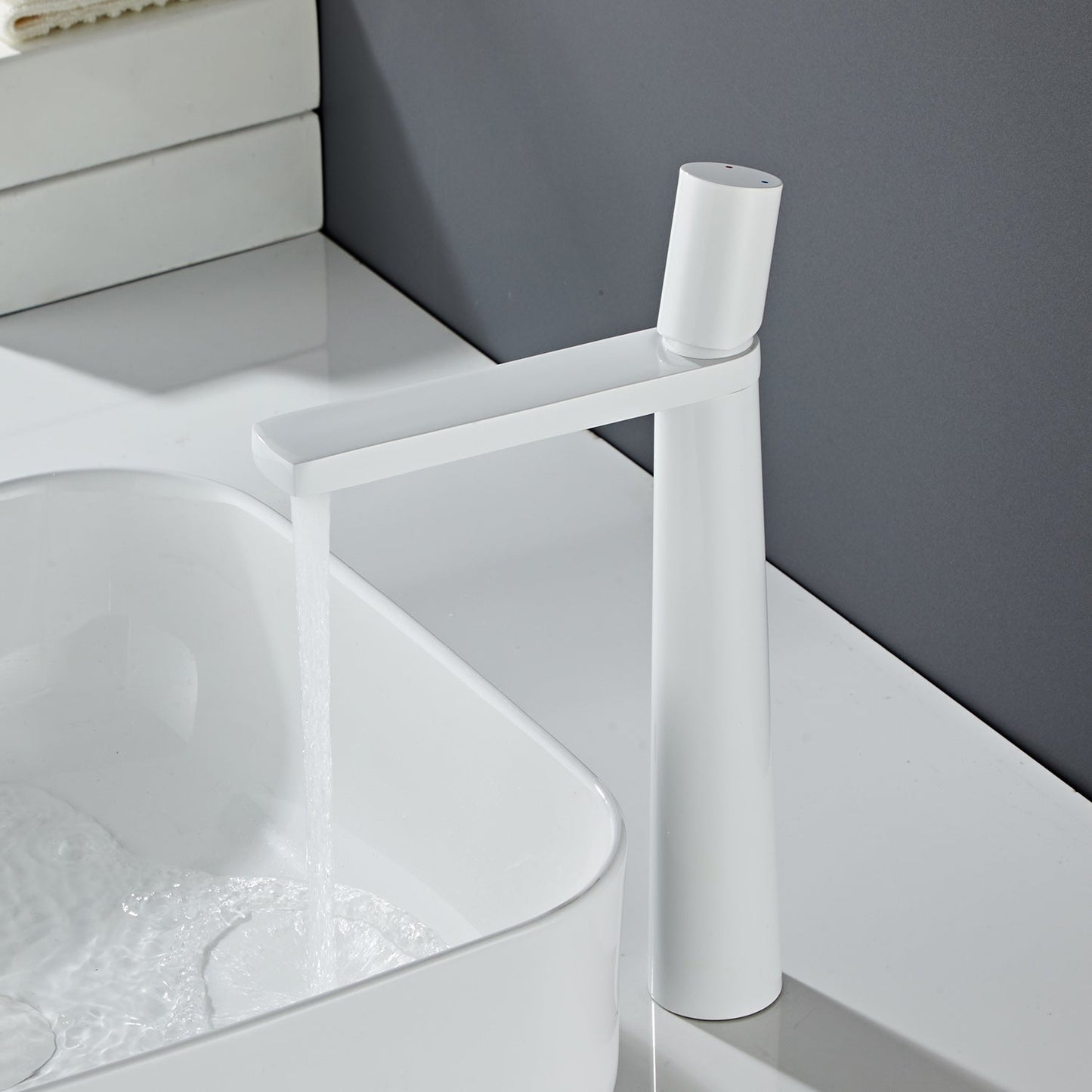 Thalruvne | Modern Cylindrical Silhouette Single Hole Bathroom Sink Tap with Rotary Knob