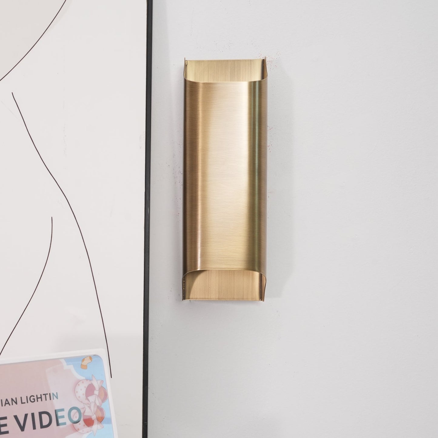 Kestrelon | Sleek Silhouette Geometric Brass Wall Light