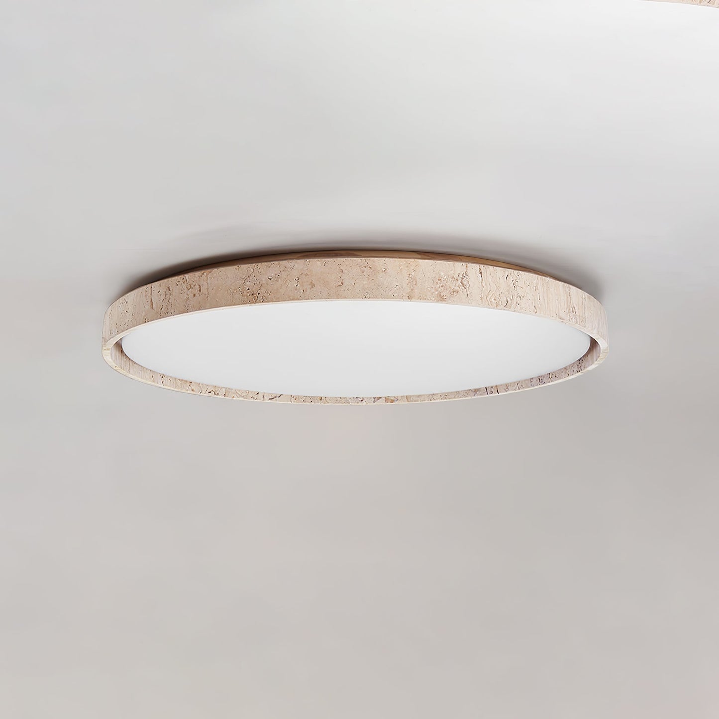 Aeristhos | Minimalist Hand Carved Round Travertine Stone Ceiling Light