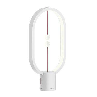 Thalamore | Elliptical Floating Magnetic Balance Table Lamp