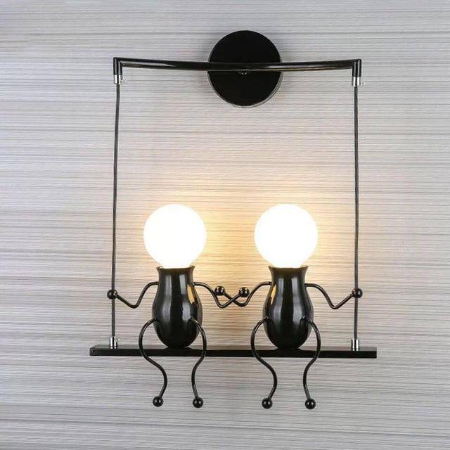 Zyrelia | Contemporary Swinging Figure Metal Wall Light Fixture