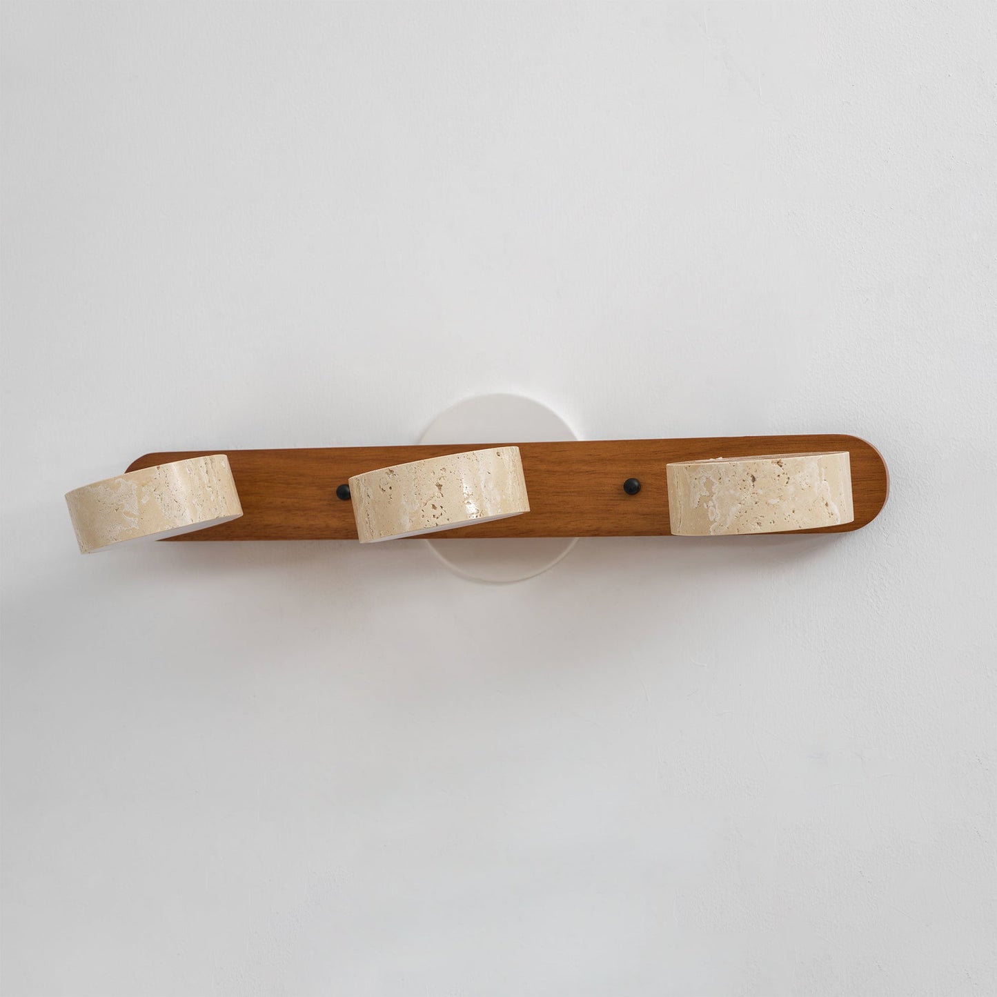 Nyxoris | Geometric Textured Travertine Vanity Wall Light