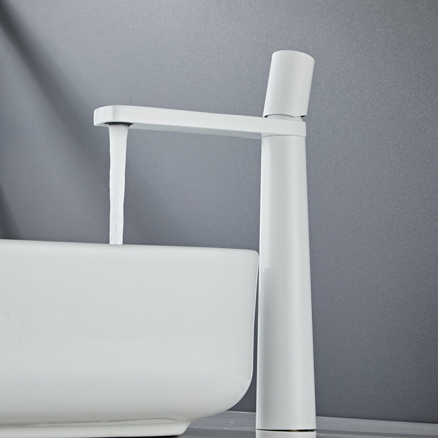 Thalruvne | Modern Cylindrical Silhouette Single Hole Bathroom Sink Tap with Rotary Knob