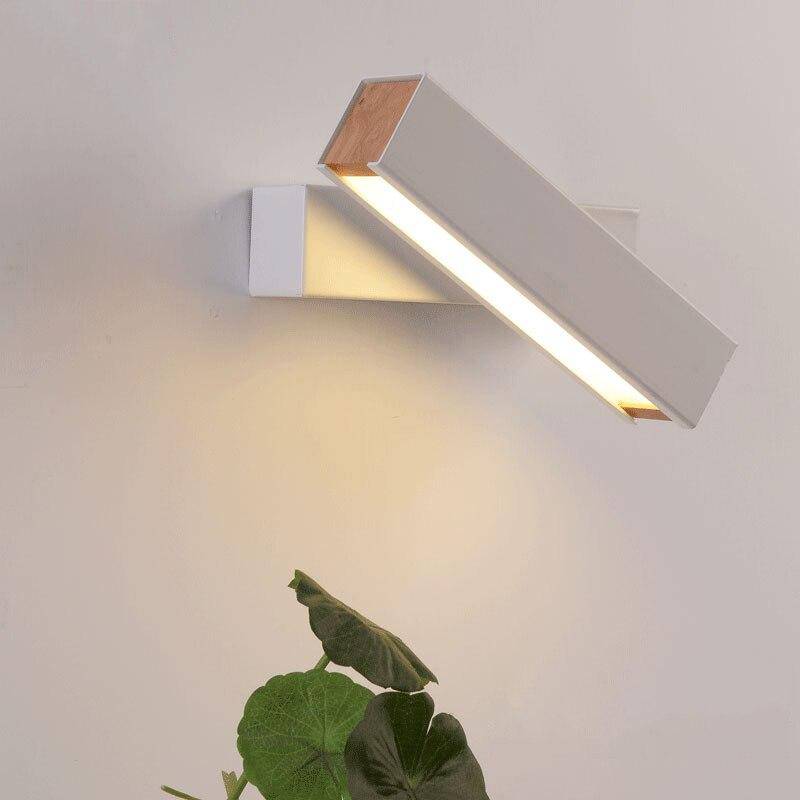 Kelvarna | Contemporary Abstract Sculptural Dual Glow Rotating Wall Light