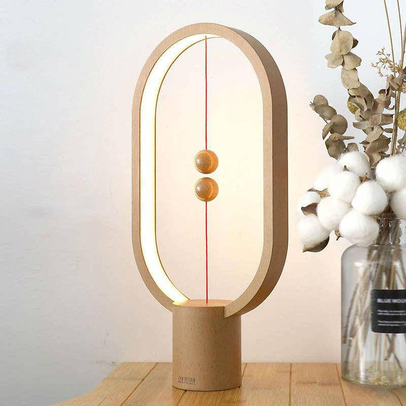 Thalamore | Elliptical Floating Magnetic Balance Table Lamp
