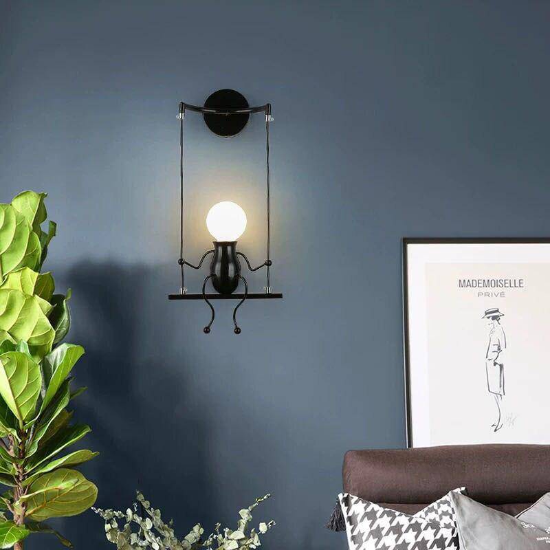 Zyrelia | Contemporary Swinging Figure Metal Wall Light Fixture